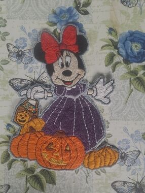 Purple Minnie Mouse Halloween Iron-On Patch with Orange Pumpkins